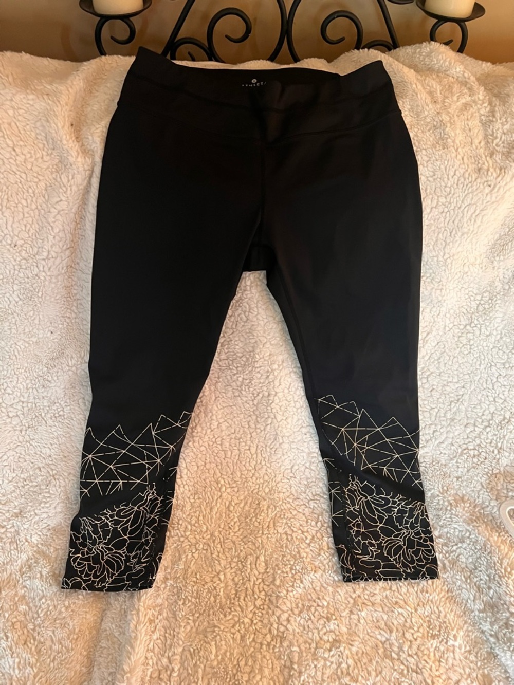 Athleta Black Capri Leggings with Subtle Logo Detail